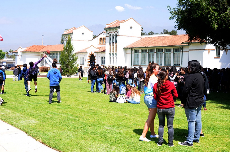 On Tuesday, June 4th, Fillmore Middle School 8th grade graduation class filled the FUSD front lawn with laughter and fun. Pizza and games were the reward for the class, under the supervision on teacher Jennifer Beale. Pictured below a group of students along with Beale as they enjoy their day out on the lawn.