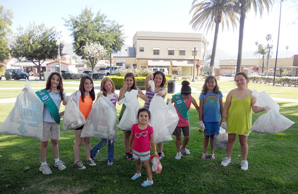 Girl Scout Troop 60697, of Fillmore, did an Earth Day clean up on Friday walking from Shiells Park to City Hall picking up trash.  The girls in the photo are Ashley McNight, Ellie Zielsdorf, Maddie Davis, Jillian Graves, Jayni Rolfe, Kalista Rodriguez, Jaelina Ramirez, and Jordyn Rolfe.  The weather was hot but we had a lot of fun anyway.