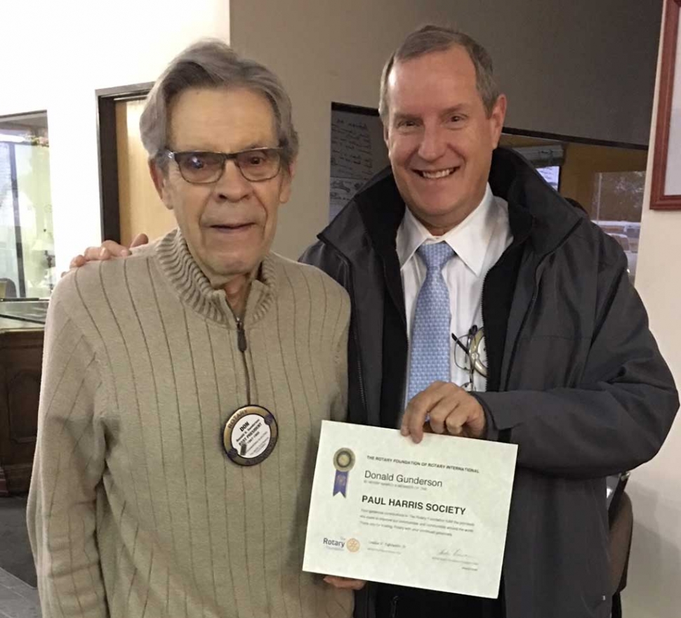 Rotarian Don Gunderson, was recognized by Kyle Wilson as a Paul Harris Society Member. Rotarians can donate to the Rotary Foundation which supports projects internationally and locally. By donating members can become a Paul Harris Fellow, Paul Harris Society Member, or Paul Harris Major Donor. No only was Don being recognized he also celebrated his birthday. Photo courtesy Martha Richardson.