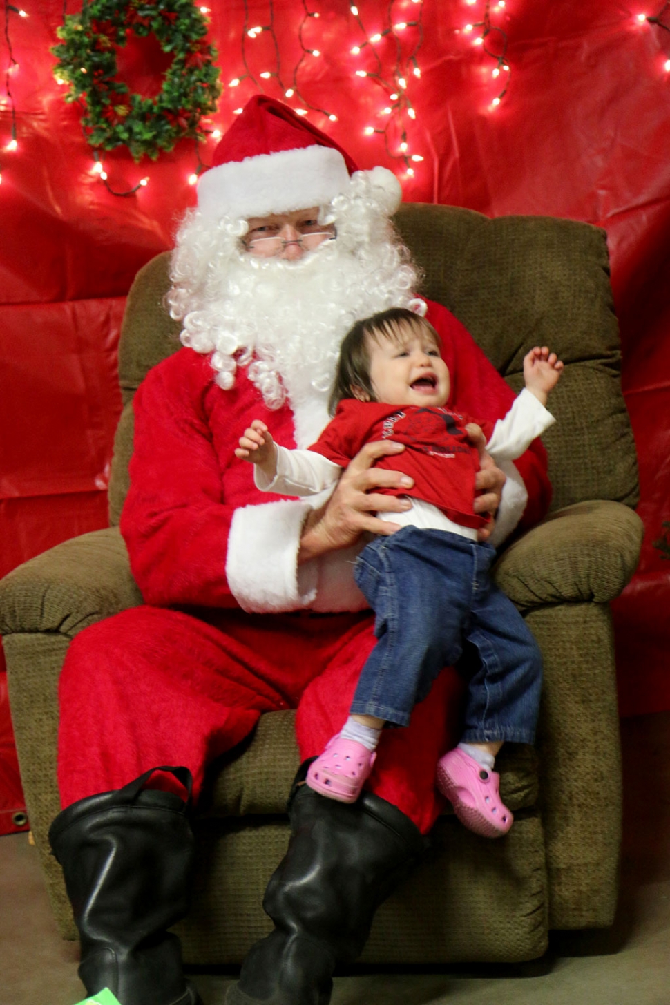 Santa was visited by a lot of happy children last Saturday at the Fillmore Fire Station Toy Drive Give-away. As we can see above, some were happier than others.