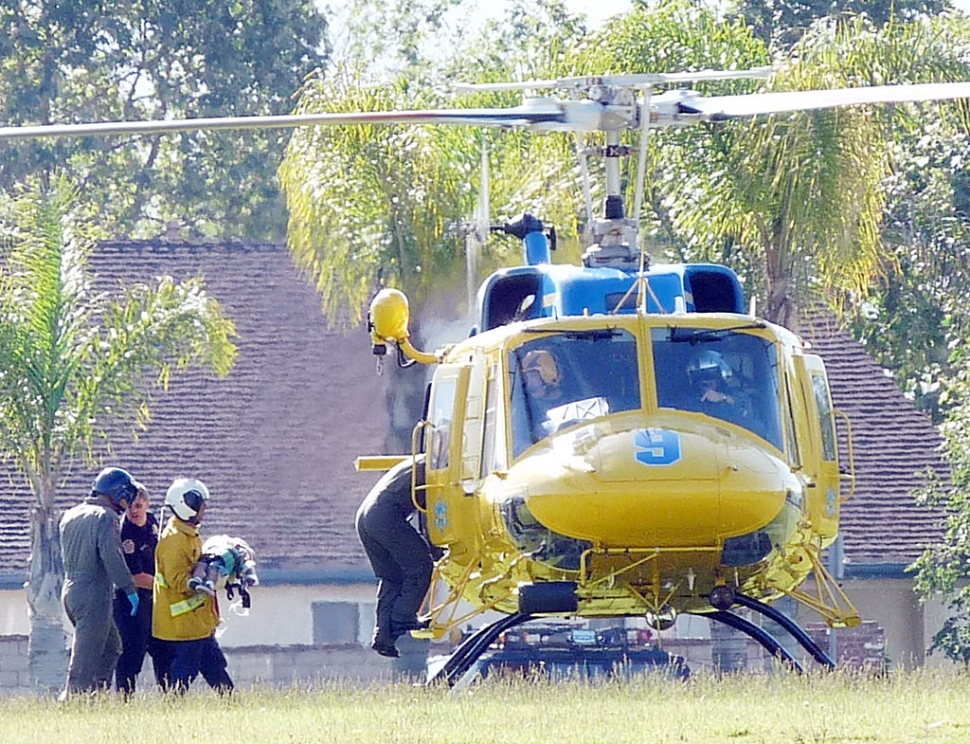 At 818 a.m., 600 Block of Boulder St., a 3-year old boy chased a ball into the street and was struck by a Honda Accord exiting out of a driveway. The child sustained serious injury and was airlifted by Sheriff Helicopter to Ventura County Memorial Community Hospital. Pictured is the child being carried to the helicopter. No further information on his condition at press time.