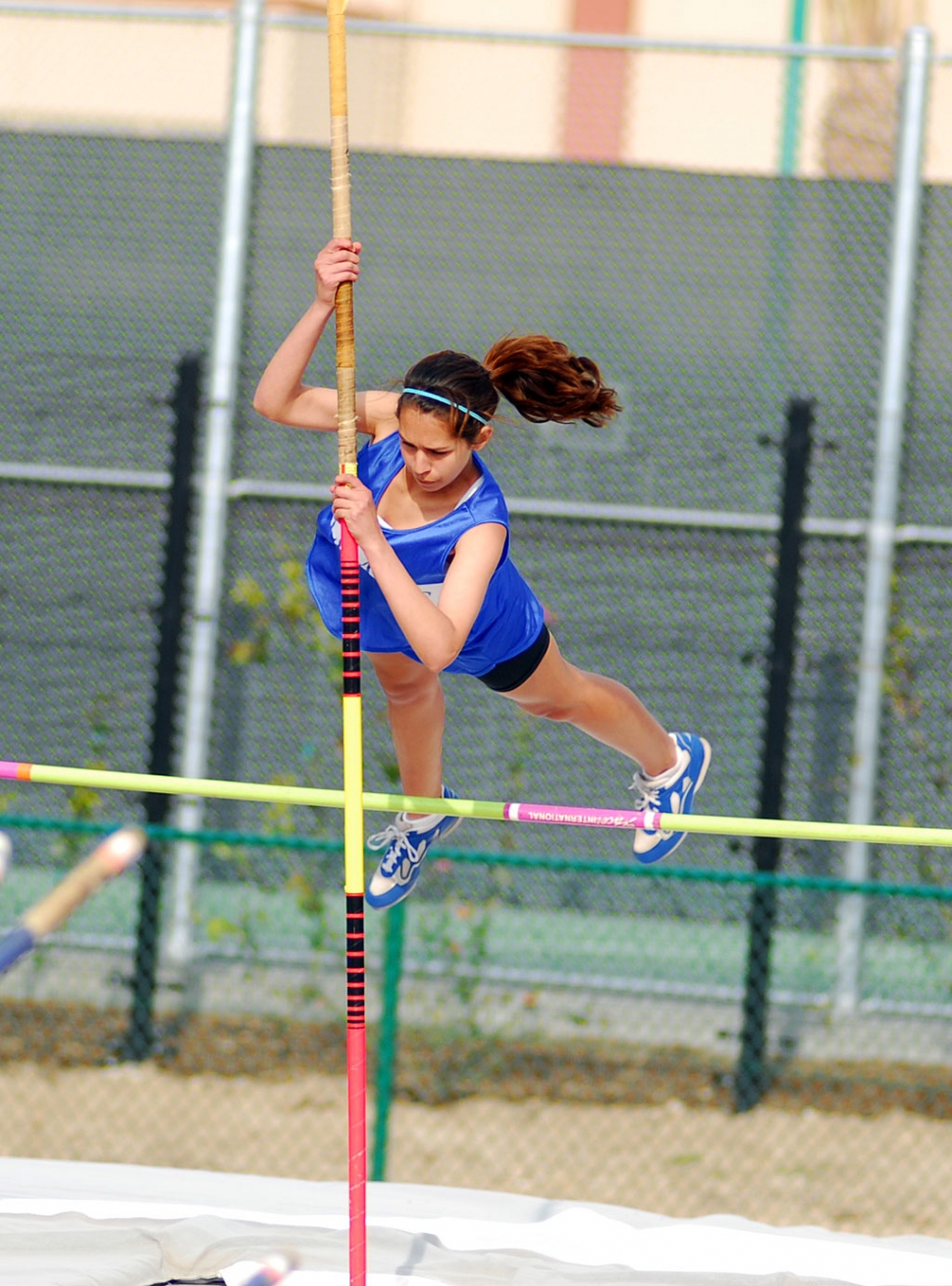 Kayla Brunett does a fantastic job on the Pole Vault.