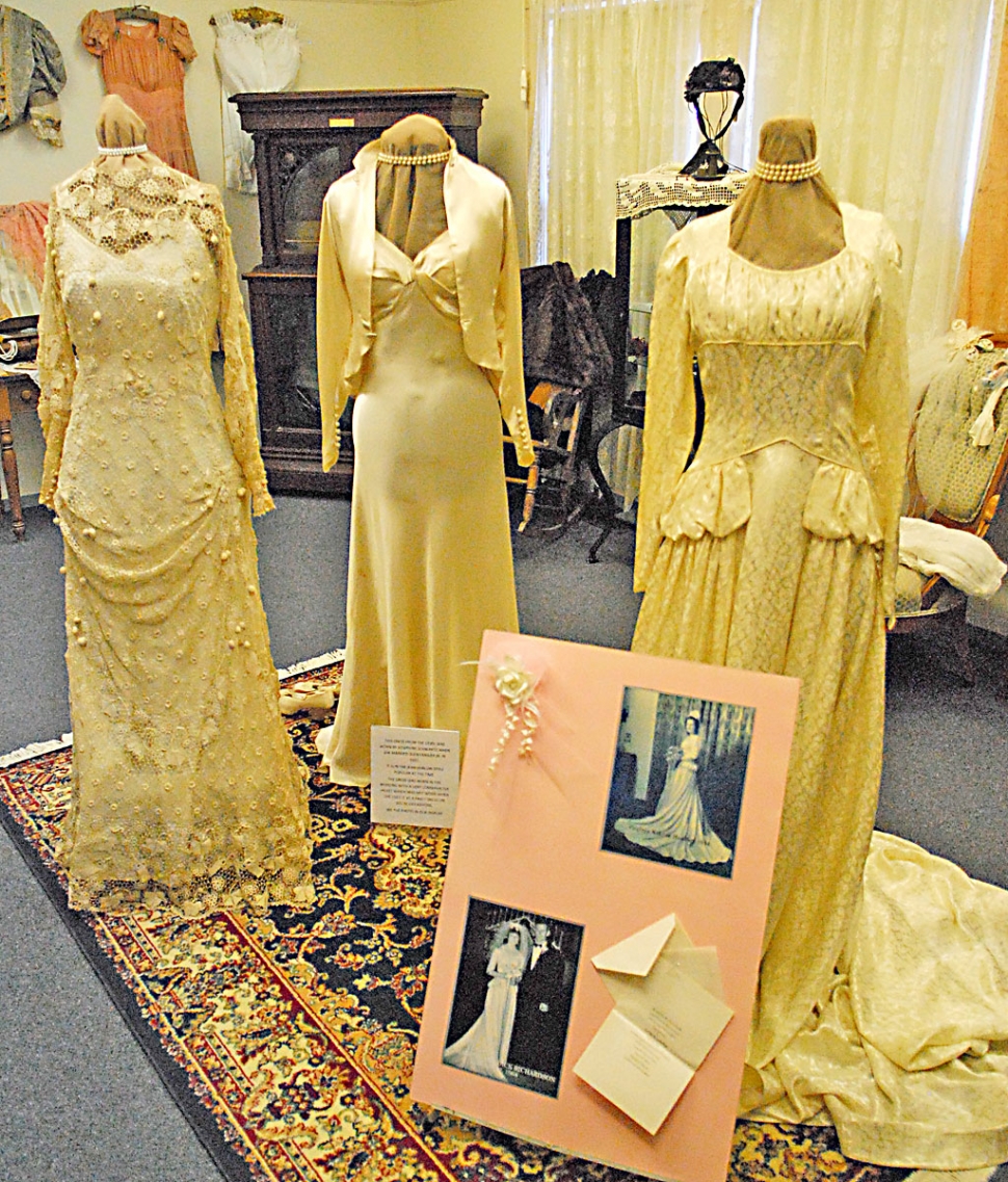 A wedding dress restorer displays more than 150 years of history