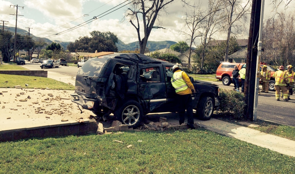 A driver plowed into two parked cars before hydroplaning into a driveway in the 400 block of Mt. View, Monday. The stolen SUV cause extensive damage to all three vehicles, and a block/brick retaining wall. A helicopter and K-9 unit were called in to assist in the search. The driver fled east on foot and was captured
later in the day.