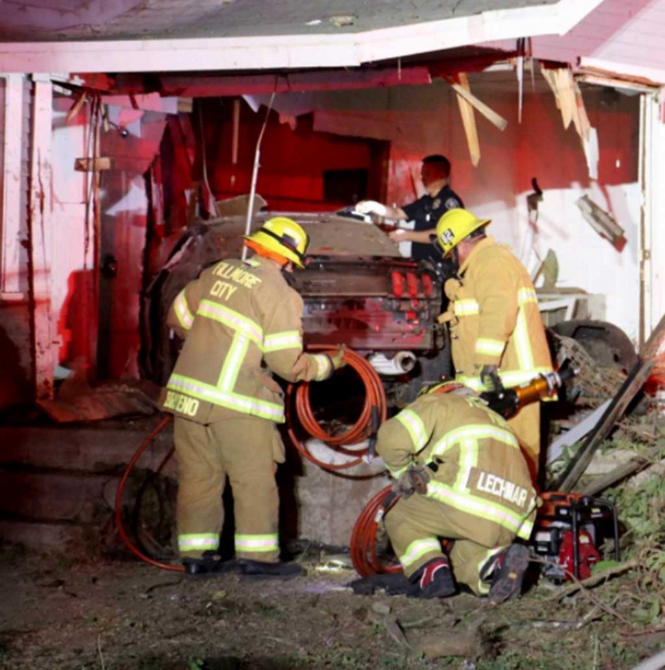 Friday, 8:32pm Fillmore Fire along with Santa Paula, Ventura County and City of Ventura Fire Departments, and Santa Paula Police Department, responded to an accident near the 18100 block of East Telegraph Road. When crews arrived on scene one person was trapped inside the vehicle which crashed into a vacant house. They were able to rescue the patient and transported her to a local hospital. Courtesy Fillmore Fire Department.