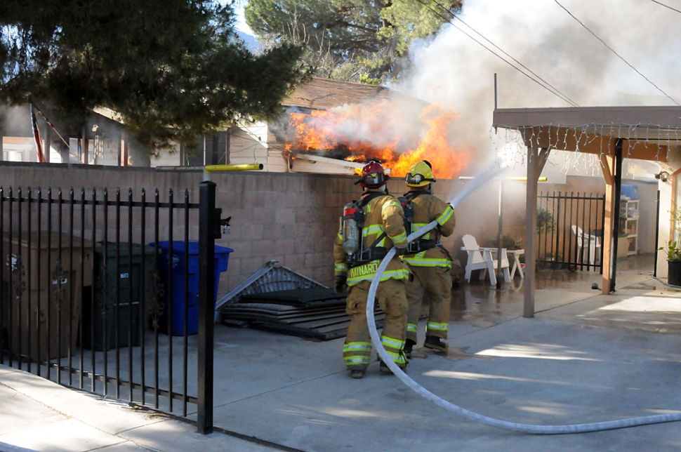 Upon arriving on scene, firefighters observed heavy smoke and fire throughout the entire 800 square foot residential structure.