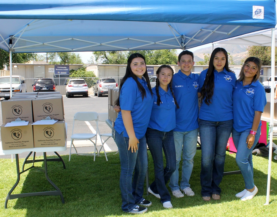 (l-r) Fillmore FFA students Jessika Aguilar, Diana Espinoza, Joaquin Holladay, Angelina Garcia Cano and Leslie Sandoval helped hand out free food during the Health and Wellness Fair. 
