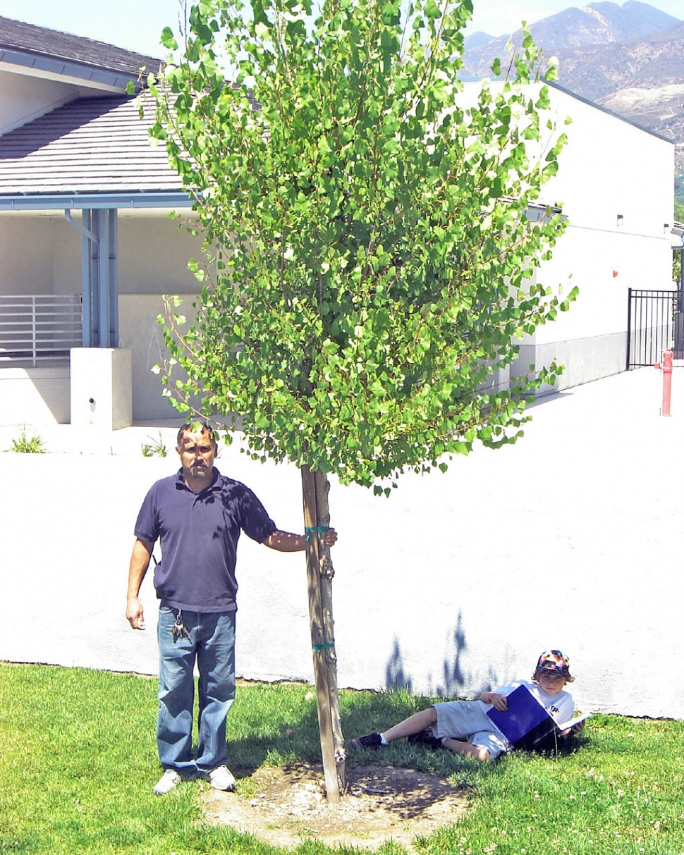 3rd grade student Jake Saviers and Custodian Jorge Negrette.