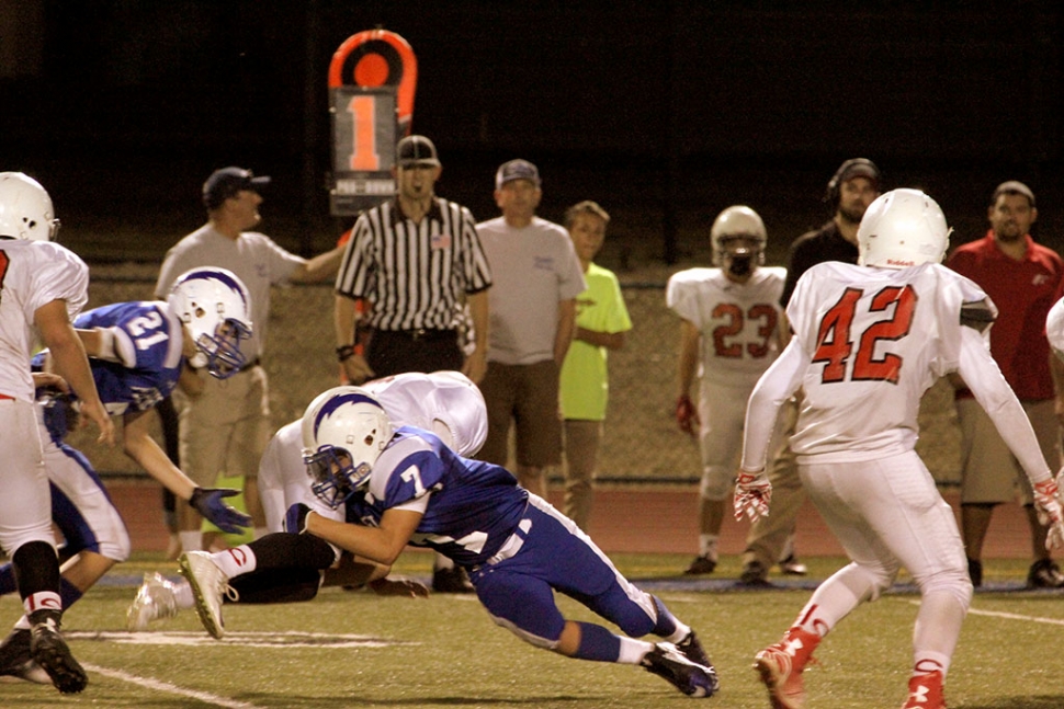 J.V. #7 Hector Sanches stops the run behind the line of scrimmage