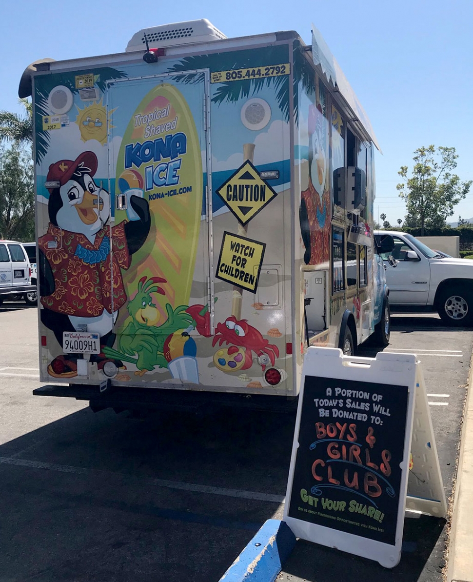 The Kona Ice truck was parked outside the Fillmore Community Pool Tuesday afternoon. The company donated a portion of their sales to the Boys & Girls Club. They also announced that they will be coming back for Rec Swim held Saturdays 9:45pm – 3:15pm and Family Night, Fridays at 6pm – 8pm. Photo courtesy Katrionna Furness.