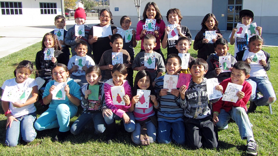 Students from Mountain Vista School wrote letters to our soldiers serving overseas. Over five classes wrote letters, wishing our heroes a happy holiday and thanking them for all that they do for our country. Pictured are students from Mrs. Castro’s 3rd grade classroom posing with their holiday cards.