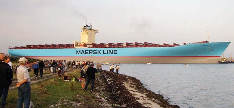 The Emma Maersk ,part of a Danish shipping line, is shown in the photos below. What a ship....no wonder 'Made in  China  ' is displacing North American made goods big time. This monster transports goods across the Pacific in about 5 days!!!

This is how Wal-Mart gets it's stuff from China. 15,000 containers and a 207'deck beam! The crew-size: 13 people on a ship longer than a US aircraft carrier (which has a crew of 5,000). Notice that 207'beam means it cannot fit through the Panama or  Suez Canals.

It is strictly transpacific. Cruise speed: 31 knots.The goods arrive 4 days before the typical container ship (18-20 knots) on a  China -to- California run. So this behemoth is hugely competitive when carrying perishable goods.

The ship was built in five sections. The sections floated together and then welded. The command bridge is higher than a 10-story building and has 11 cargo crane rigs that can operate simultaneously.

Additional info: Country of origin -  Denmark, Length - 1,302 ft, Width - 207 ft, Net cargo - 123,200 tons, Engine - 14 cylinders in-line diesel engine (110,000 BHP), 
Cruise Speed - 31 knots, Cargo capacity - 15,000 TEU (1 TEU = 20 cubic feet), Crew - 13 people!, First Trip - Sept. 08, 2006, Construction cost - US $145,000,000+, Silicone painting applied to the ship bottom reduces water resistance and saves 317,000 gallons of diesel per year.