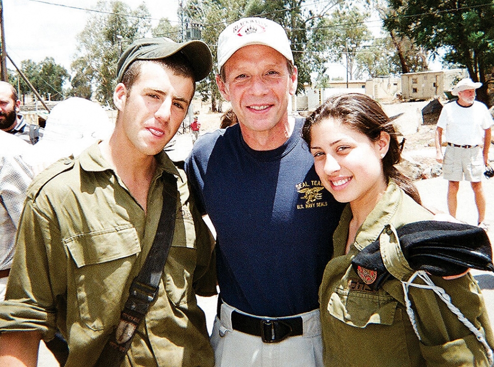 Mark Trimble pictured above (middle) is shown with two Israeli soldiers.
