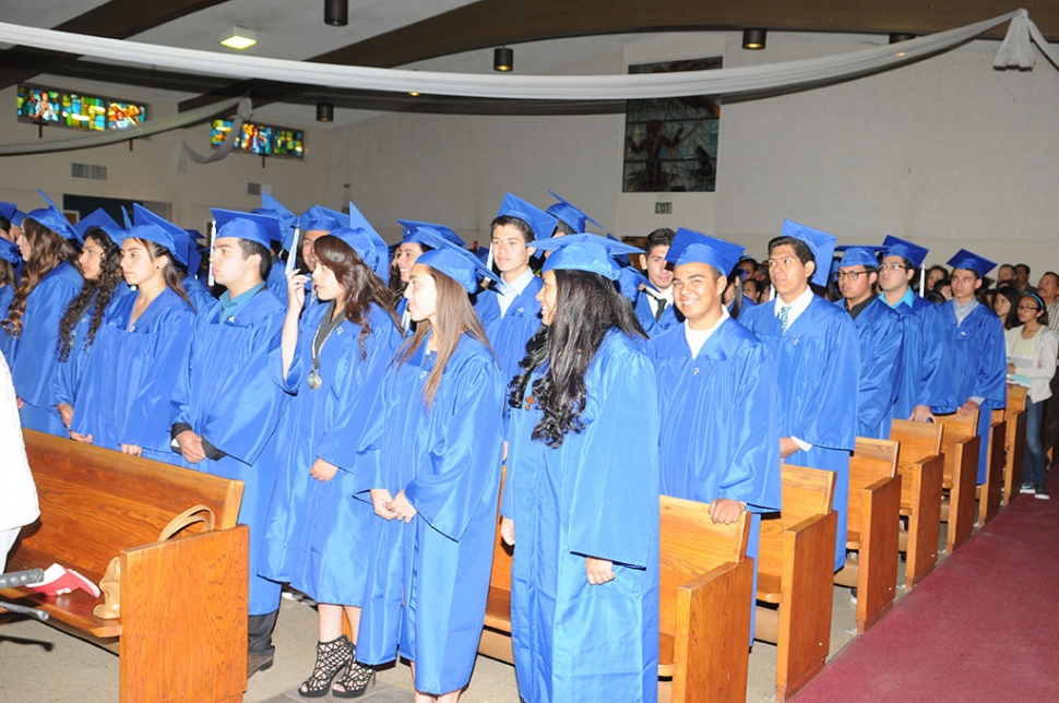 A baccalaureate Mass was held at Saint Francis of Assisi on Saturday, June 6th, a celebration that honored the graduating senior class from Fillmore High School. The Baccalaureate ceremony is a service of worship in celebration of and thanksgiving for lives dedicated to learning and wisdom. It is believed to have originated
at the University of Oxford in 1432 when each bachelor was required to deliver a sermon in Latin as part of
his academic requirements. Inset, dinner was served afterwards.