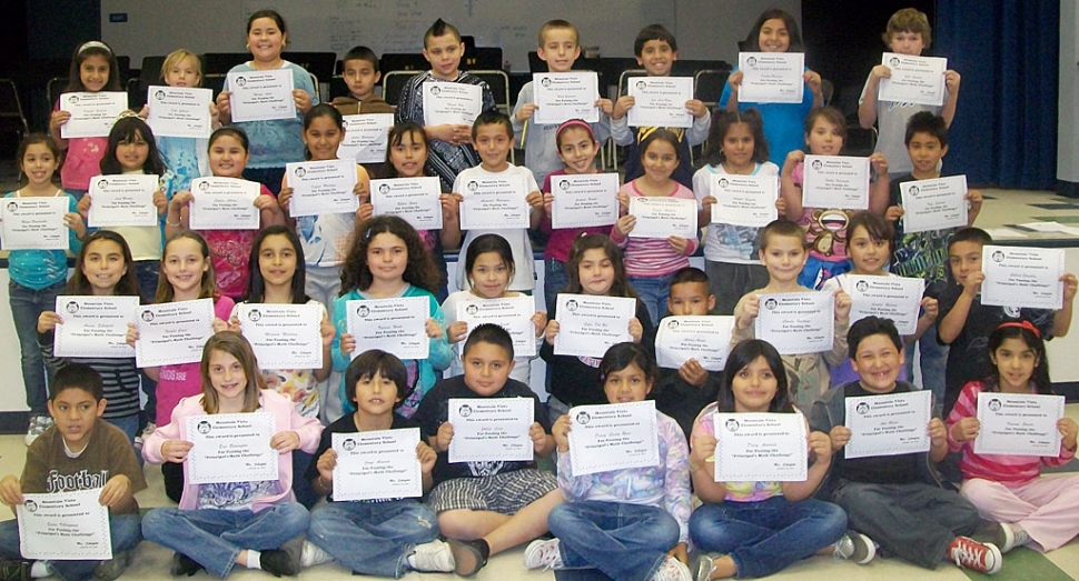 Pictured above are 39 of the 49 Third grade students who were awarded the Principal’s Math Challenge Award. First grade recipients are as follows: Juan Pablo Alfaro, Justice Rodruguez, Elizabeth Rohrer, Sydney Beckett. Second grade had fifteen out of 31 students awarde. Fourth grade recipients are Luke Myers, Alexandra Maritinez, and Maria Lopez. Andy Arana was the only 5th grader to pass the challenge. In order to increase mastery of math facts and promote school spirit, students at Mountain Vista Elementary School are participating in “The Principal’s Math Challenge”. Students are given four minute timed tests in their classrooms. Timed tests range from thirty subtraction facts in 1st grade to 100 multiplication and division facts in 5th grade. Any student who scores a 100% on their classroom test is eligible to “challenge the principal” on a three minute timed test. Students who master the three minute timed test at 100% are awarded a certificate by the principal and are recognized throughout the school. The next challenge is February 26th! GO WILDCATS!!!