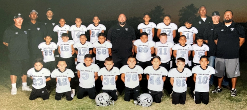 Congratulations to the Fillmore Raiders Mighty Mites Silver for going undefeated in their 2022 season as first year players the team will head into playoffs this Saturday, October 29th in their first playoff game. Top row: 9 Esteban Suarez, 4 Issak Romero, 24 Jociah “Dos XX’S” Rodriguez, 13 Aiden Hermosillo, 27 Gabriel Torres, 1 Cruz Venegas. Middle row: 99 Max Magana, 15 James “Tornado” Cabral, 17 Kacey Morales, 56 Matthew Ruiz, 29 Jayden Gonzales, 11 James Page, 7 Joseph Lara, 5 Joel Gonzales. Bottom row: 23 Mason “Quete” Negrete, 42 Jared Munoz, 3 Danny Munoz, 34 Isaiah Rivera, 78 Romero Ruiz, 44 Danny Gaspar, 82 Ronan Zavala. Not pictured is 10 Presley Ramirez. Coaches are as follows: Head Coach Gene Cabral, along with Assistant coaches Jake Ellis, Tony Rodriquez, Manny Romero, Ricky Gonzales, Jess Rivera, Nathan Page and Vidal Romero.