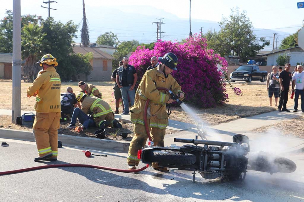 On Saturday, July 1st at approximately 7 p.m. Fillmore Fire responded to a traffic collision at the intersection of Ventura Street and Orange Grove. Upon arrival they found a smoldering motorcycle on the ground, and two injured patients. The motorcycle had collided with an SUV. The two patients on the motorcycle received moderate injuries and were transported to Santa Paula Hospital for further evaluation. The accident is under investigation by the Sheriffs Department. Photo courtesy Fillmore Fire Department. 