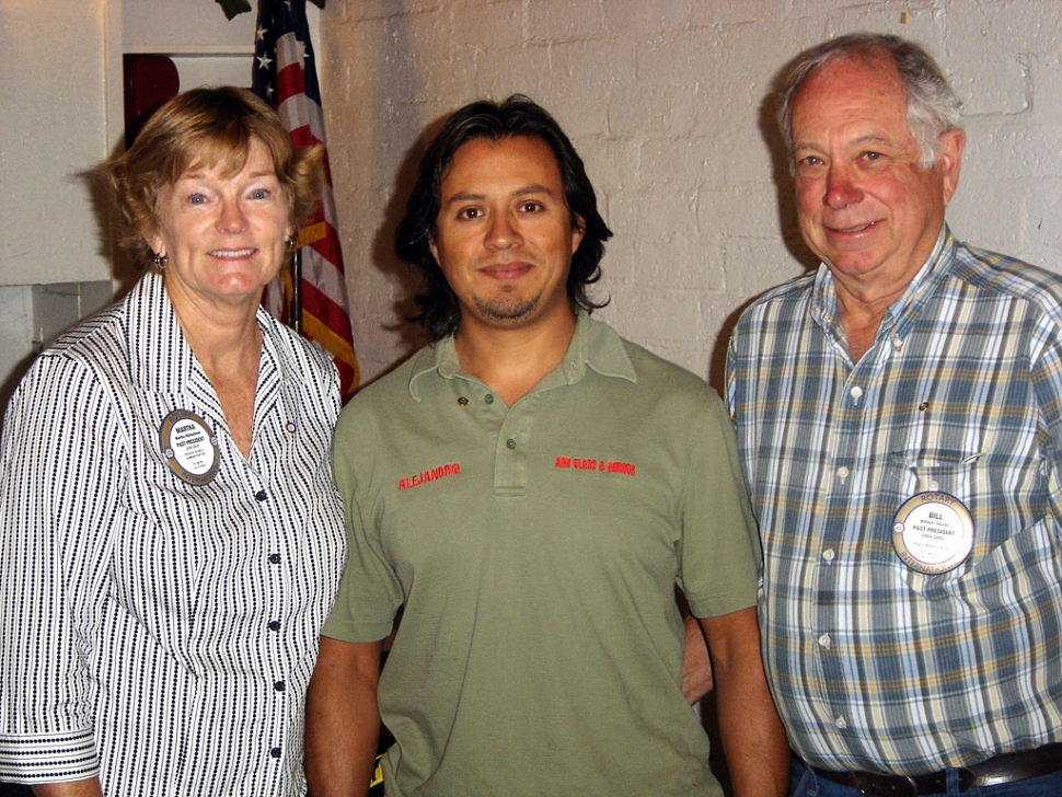 (l-r Martha Richardson, Past President, inductee Alejandro Nieto, a residential glazer for Aim Glass & Mirror, and President Bill Shiells) The Rotary Club of Fillmore-Noontime has inducted a new member.