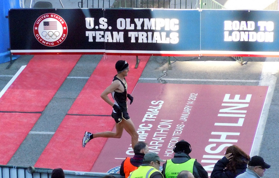 Brian Ball of Fillmore crosses the finish line at the U.S. Olympic Marathon.