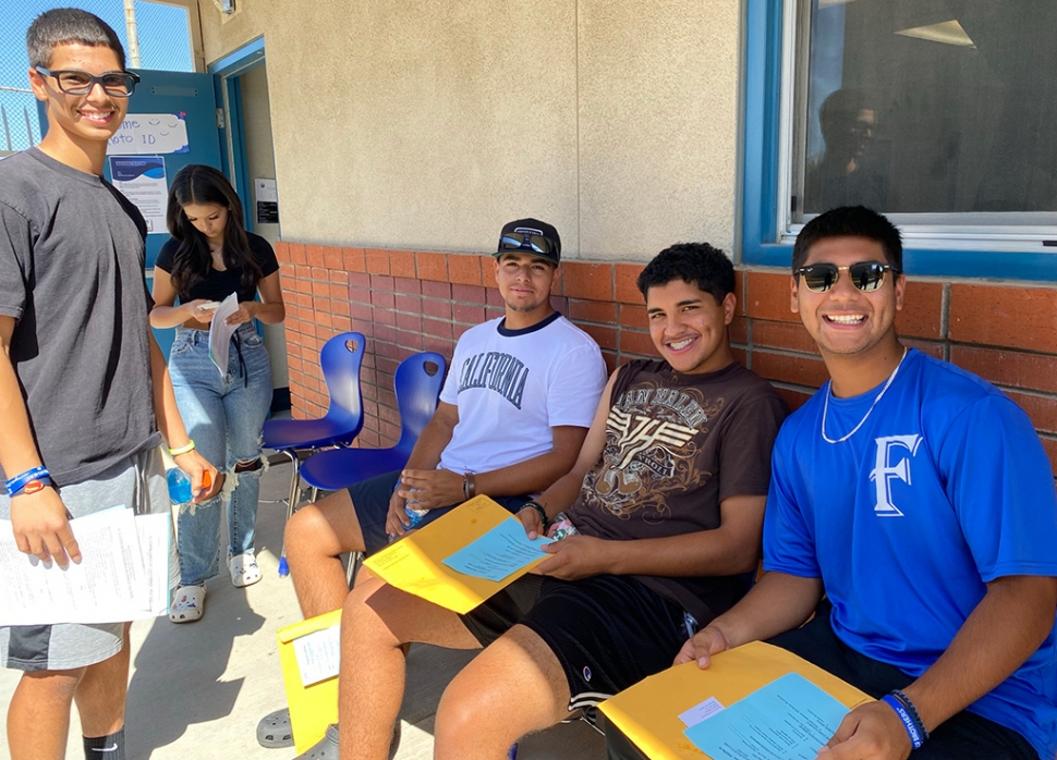 On Tuesday, August 9th, it was all smiles all day at Fillmore High School with students registering for the 2022-2023 school year. Above and below are students as they wait to get class schedules, ID cards, locker assignments, etc. Classes start next week, August 17th. Hope the Flashes are ready!