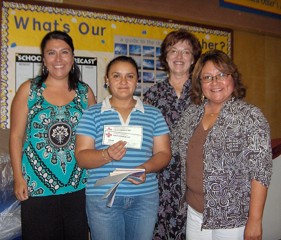 A raffle was held at the end of the Title 1/Migrant Night evening; the prize, a $25 gift certificate for Super A. Pictured are Chrissy Schieferle, Principal of Mountain Vista, Sandra Herrera – the winning parent, Geri Lunde, Principal of Sespe School and Barbara Leija, ELD Coordinator for Fillmore USD. Tricia Gradias, Migrant Education/CBET Coordinator for Fillmore USD and Barbara Leija, ELD Coordinator for Fillmore USD spoke to the Spanish Speaking Parents while Carol Barringer, Fillmore USD Projects Director, presented to the English Speakers.