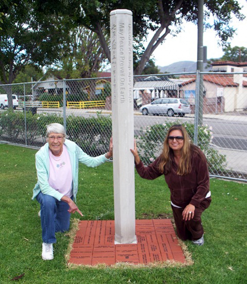 (l-r) Sarah Hansen and Ari Larson, President of Soroptimist International of Fillmore by the Peace Pole located in the front of Fillmore City Hall.