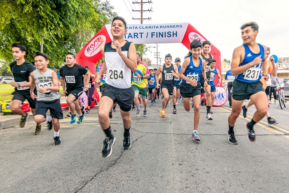 Photo of the Week: "Start of the Rotary Club 5K-10K & Fitness Walk race" by Bob Crum. Photo data: Canon 7DMKII camera, manual mode, Tokina 11-16mm @13mm. Exposure: ISO 320, aperture f/11, 1/200th second shutter speed.