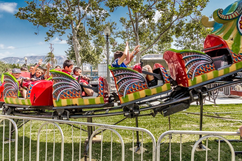 Photo of the Week "The fierce dragon roller coaster at the May Festival carnival" By Bob Crum. Photo data: Canon 7DMKII camera, manual mode, ISO 640, Tamron 16-300mm lens @16mm, aperture f11, shutter speed 1/500 second.