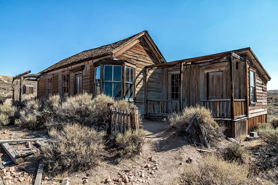 Photo of the Week "Bodie ghost town home complete with outhouse" by Bob Crum. Photo data: Canon camera, manual mode, Tamron 16-300mm lens @15mm. Exposure; ISO 320, aperture f/.9.5, 1/250sec shutter speed.