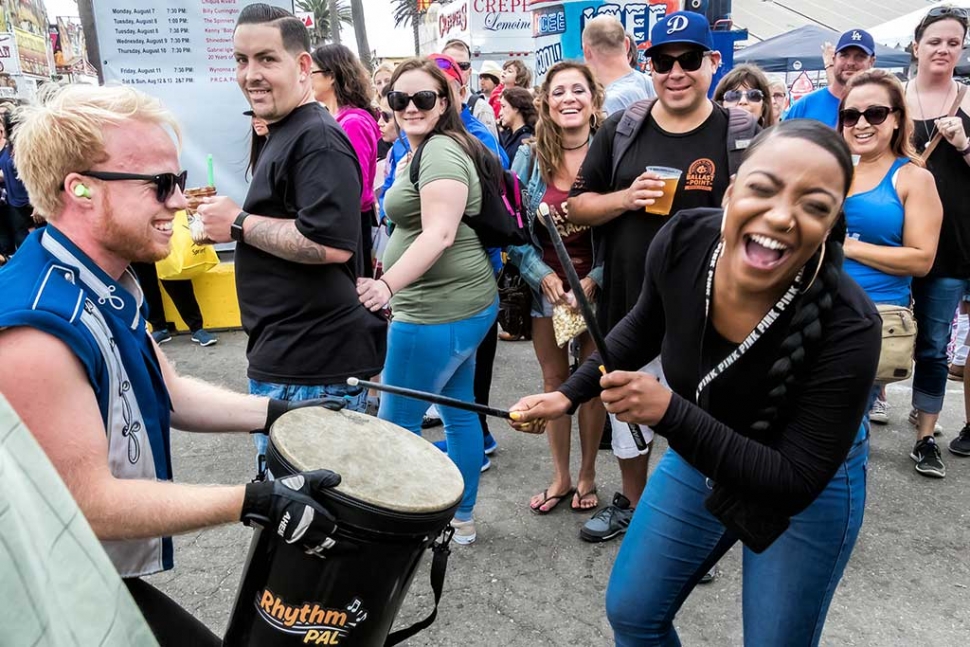 Photo of the Week "Joyful drummer at the County Fair" by Bob Crum. Photo data: ISO 3200, 18mm, f/11 @
1/320 seconds.