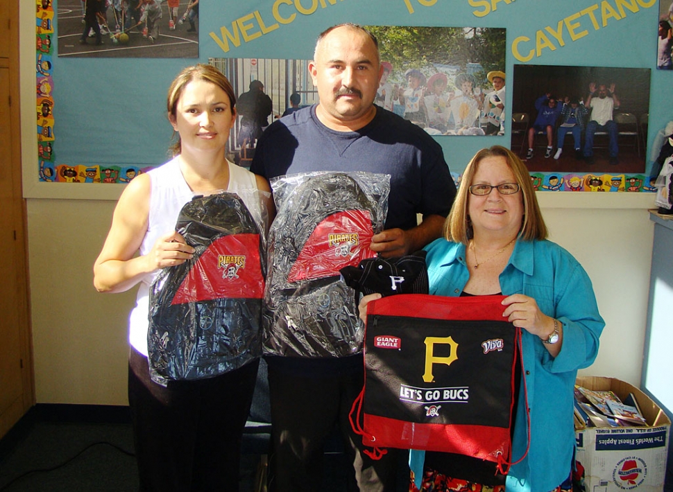 Hector and Maria Quintero are shown with San Cayetano Principal Jan Marholin. Mr. Quintero works with someone affiliated with the Pittsburg Pirates Baseball Team who wished to donate prize incentives to a local elementary school. Students who have good attendance will be able to be in a drawing for Pirates hats, backpacks, sunglasses and much more. The Quintero’s son Daniel attended San Cayetano in 5th grade. Actually, Mr. Quintero also attended San Cayetano when he was in grade school. San Cayetano thanks the Quintero Family and the Pittsburg Pirates!