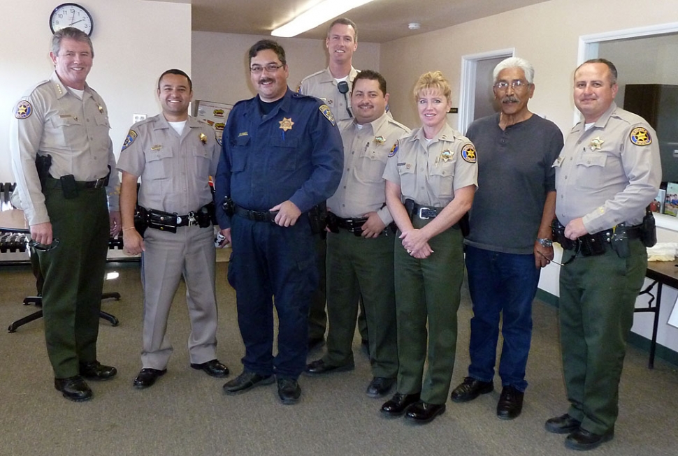 Law enforcement turned out for Tuesday’s Police Storefront Christmas. Sheriff Geoff Dean is pictured far left, (r-l) Deputy Leo Vazquez, Community Resource Officer Max Pina, and Fillmore Sheriffs Capt. Monica McGrath, with Fillmore deputies and probation officer.