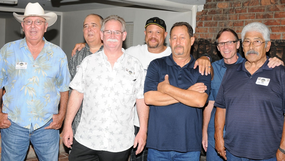 Attending the police reunion were (l-r) Elmo Sheeran, Paul Glanville, Duke Bradbury, Kim Garret, Tony Morales (arms crossed), Mark Trimble and Max Pina. Organizers of the event were Ernie Gutierrez, Duke Bradbury, Max Pina, Tony Morales. Fillmore Explorers came out to help serve the dinner. What a great event!
