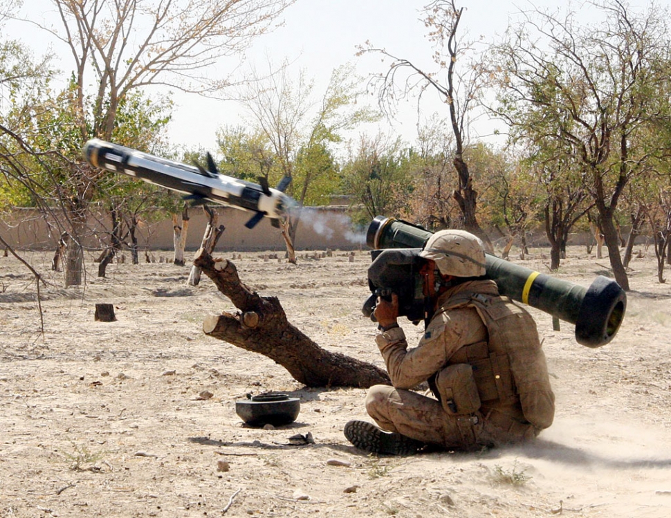 Corporal Ray Alvarado, a vehicle commander assigned to Weapons Company, Task Force 2nd Battalion, 7th Marine Regiment, 1st Marine Division, and a Fillmore, Calif., native, fires a Javelin missile at enemy targets during an assault on a Taliban-held compound August 28, 2008.