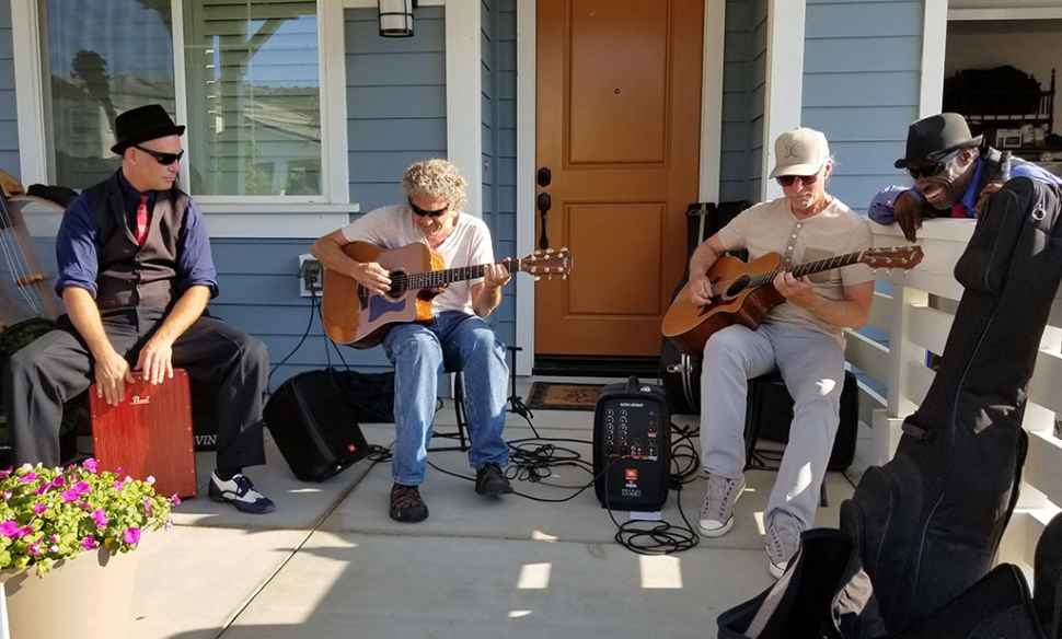 (l-r) Todd Szabo, Curt Brock, David Storrs, and Kingfish enjoying themselves and the music at this year’s Porch Fest which was held this past Saturday, August 4th at the Bridges subdivision east of Rio Vista Elementary School. 