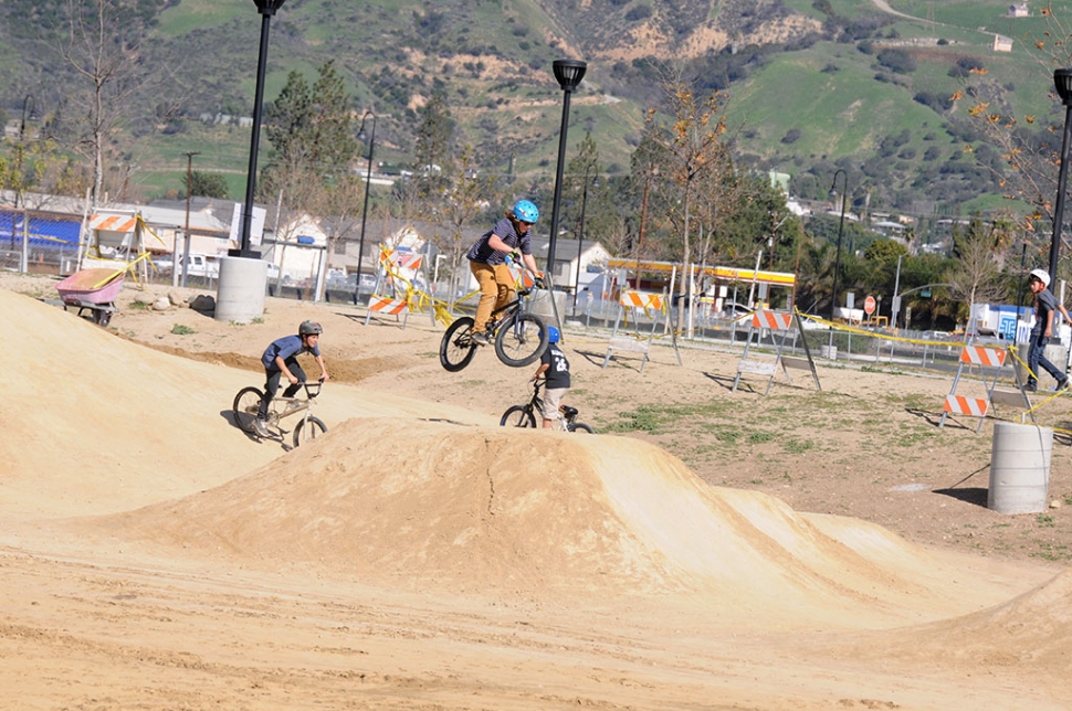 The new bicycle pump-track was full of adults and kids alike over the weekend. Some came from as far away as Valencia to use Fillmore’s new track. Some heavy equipment was working the track on Monday, but that did stop the bike enthusiasts from riding the course. After a rain the track must be completely dried out before use and needs attending about once a month, clearing rocks and weeds.