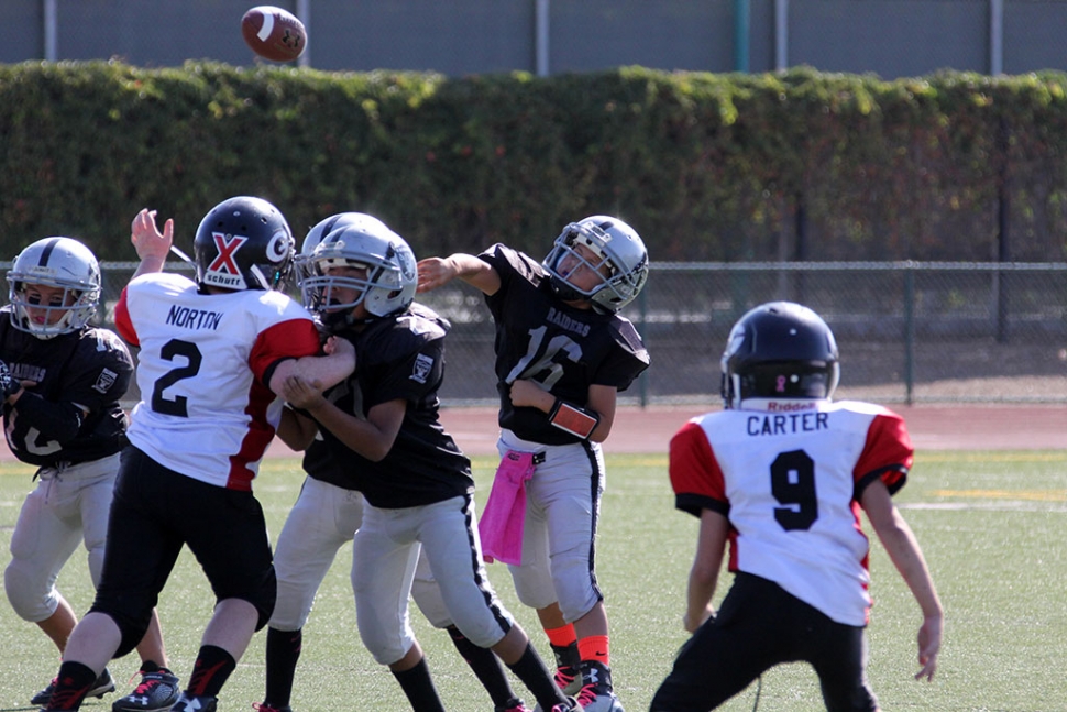 #16 Raiders Bantams makes a pass. Photos courtesy Crystal Gurrola.