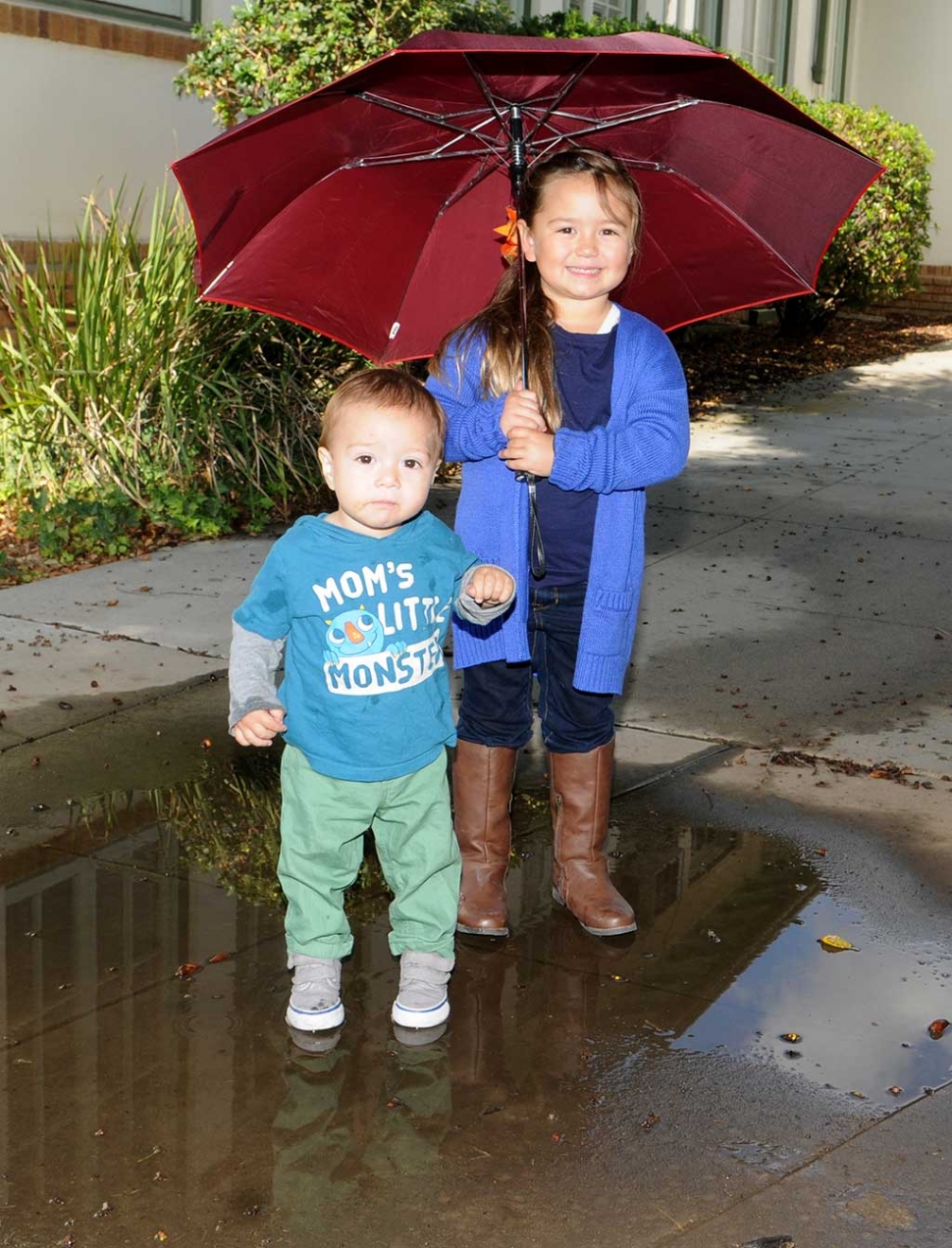 Sara and Jackson Stone enjoy a moment in the rain.