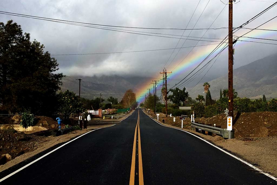 There was gold at the end of the rainbow on Grand Avenue last Sunday. Eye witnesses reported a short fellow dressed in green fleeing the scene.