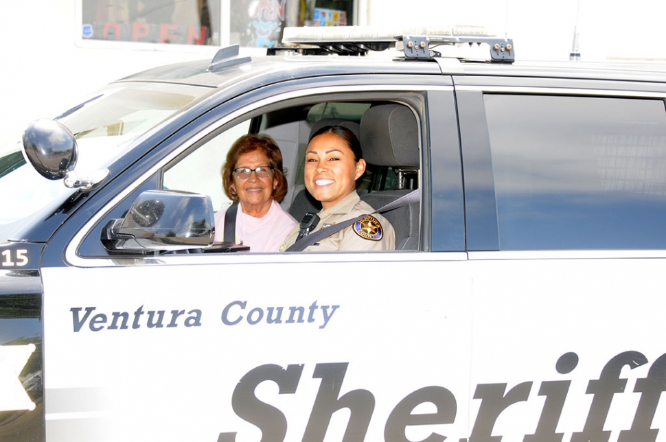 Monday, June 3rd at 11 a.m., just outside the Fillmore Police Station, Deputy Veronica Grayball was seen giving a ride along tour to Vicenta Hidalgo, as part of the Spanish Citizens Academy Program, where the students get a chance at a hands-on experience of police work.