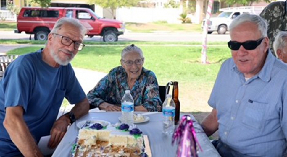 Happy 100th birthday Alice Bustamante Romero, pictured above with sons Steve (left) and Petey.
