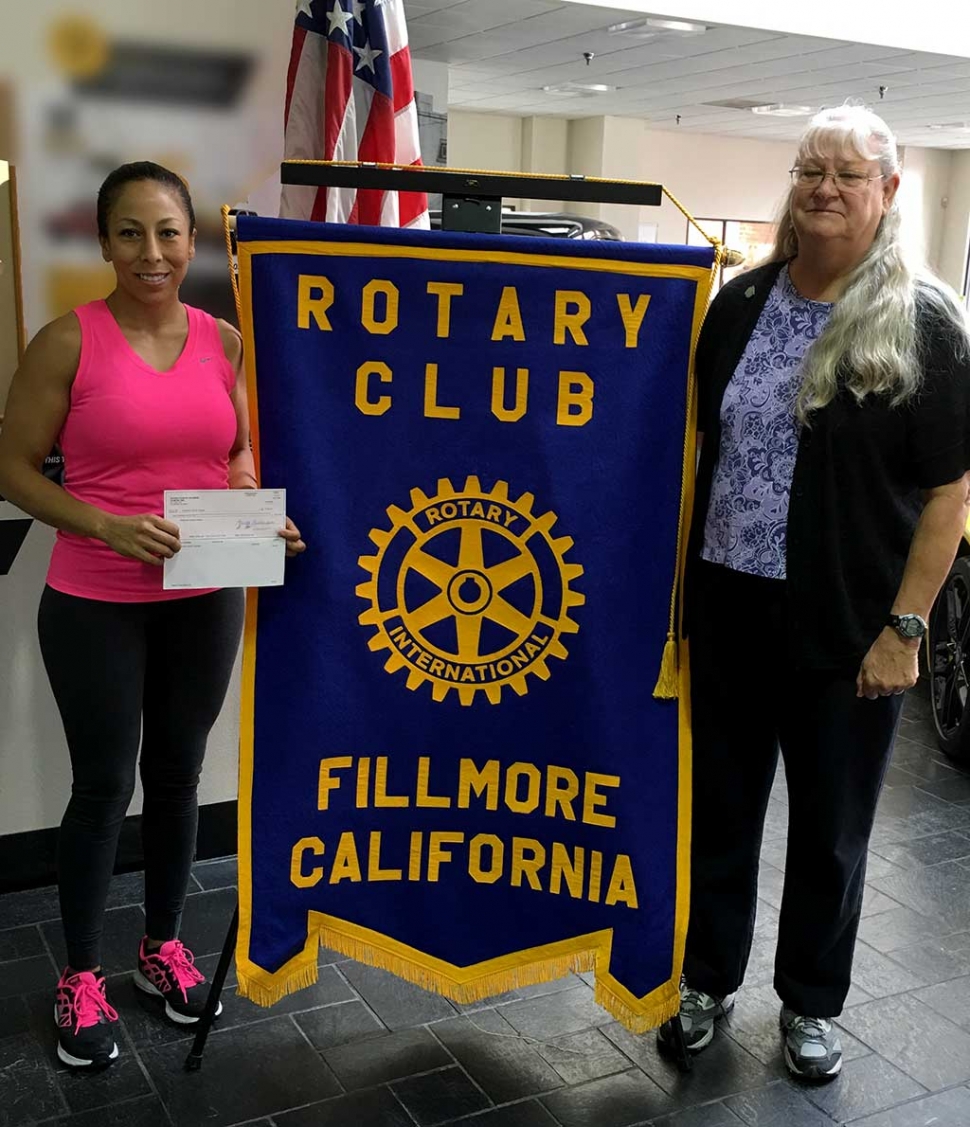 Rotary Makes Donation To Relay For Life Team. Tania Melgoza, representing the Estrella Market team, accepted a check, from Cindy Blatt, for $100 to the American Cancer Society. This check will then be presented to the One Love Relay for Life team. The Estrella Market took the Heritage Valley 5/10K Team Challenge and placed second overall in the 10K Run. Rotary Club of Fillmore awards donations for favorite charities to the top two teams in each of the 5K and 10K and the team with the most participants.
