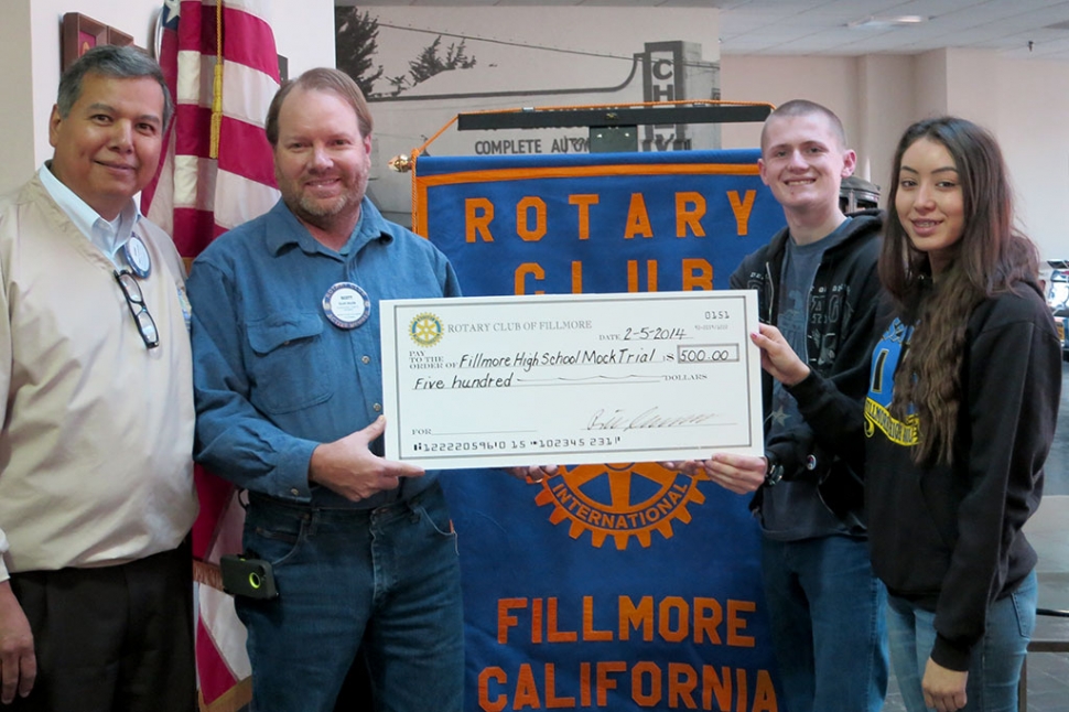 Fillmore Rotary presented the Mock Trial Team with a check for $500. (l-r) Presenters were Rigo Landeros and Scott Beylik accepting the check were team members Matthew Hammond and Maria Ibarra.