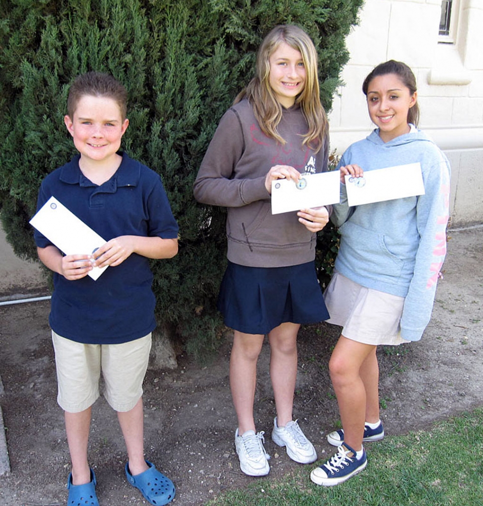 Pictured (l-r) Michael Hill, Carli Krizer and Brooke Pimentel, of Fillmore Christian Academy, received awards in the 4-Way Test & Me Essay Contest from the Fillmore Noontime Rotary.