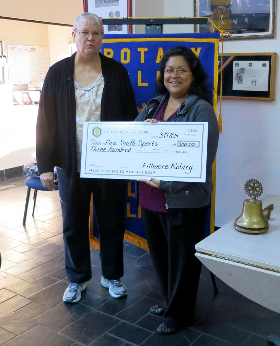 Cindy Blatt, of the Rotary Club of Fillmore, presented Joanne Torres, of Piru Youth Sports, a check for $300. This is the sixth year of youth sports with over 160 students involved in baseball this season.