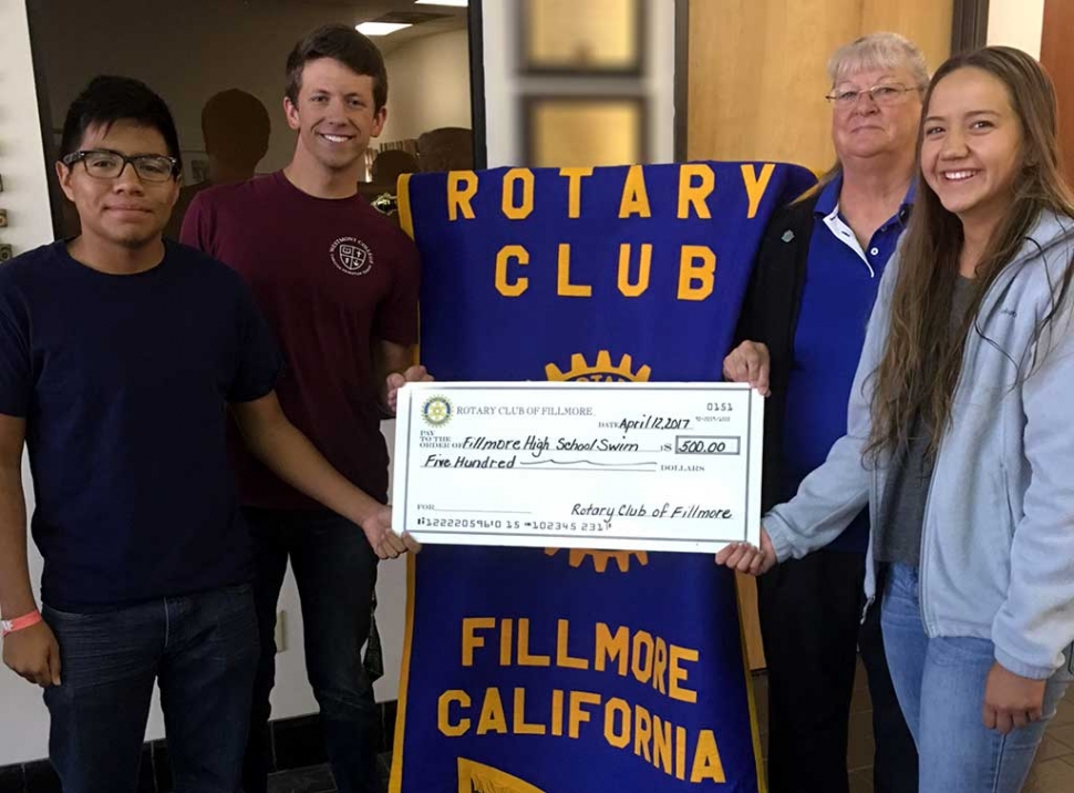 Rotary Club Donates to FHS Swim Team. Fillmore Swim Team members Jose Ruiz, Luke Myers, and Aviana Ramirez receive check for $500 from Rotarian and Swim Coach Cindy Blatt. Submitted By Martha Richardson.