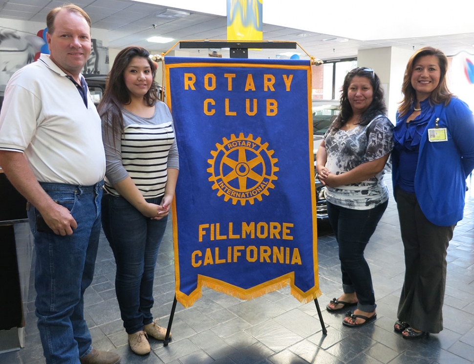 The Rotary Club of Fillmore presented a Sierra High School scholarship award. (l-r) Scott Beylik, Rotarian, Yuliana Sanchez, her Mother, Claudia Diaz, Principal, Cynthia Frutos