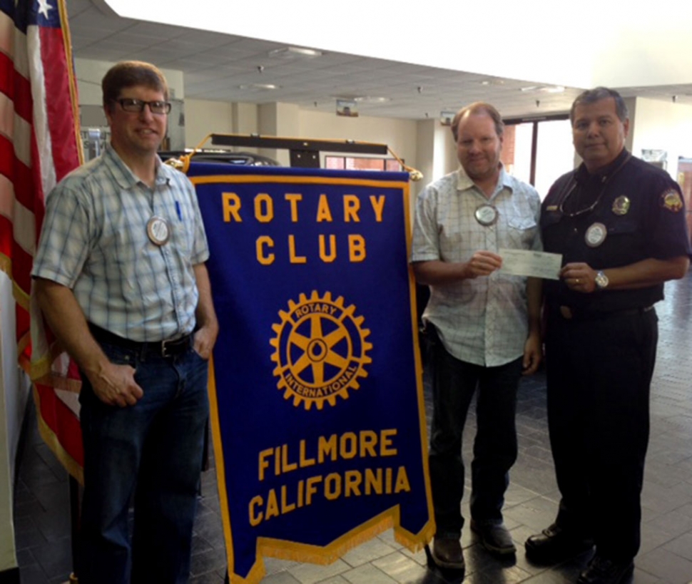 Rotary present check to Fillmore Fire. Sean Morris and Scott Beylik present a check to Fillmore Fire Chief Rigo Landeros for the Fire Foundation. This money will be a sponsorship for the golf tournament and ultimately aid in paying for the mandatory training and fire equipment for Fillmore Fire Department.