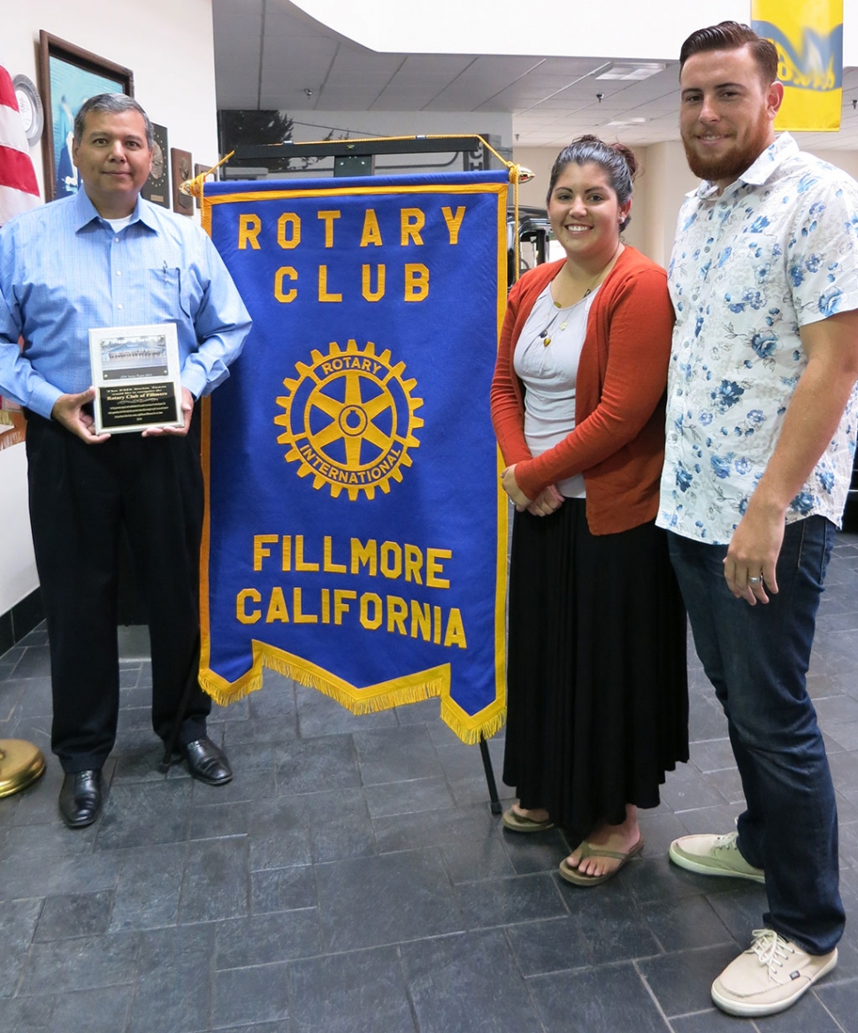 Lindsey and Ryan Cota, swim coaches at Fillmore High School, presented the Rotary Club of Fillmore and Rigo Landeros, President, with an appreciation plaque for their continued support to the team.