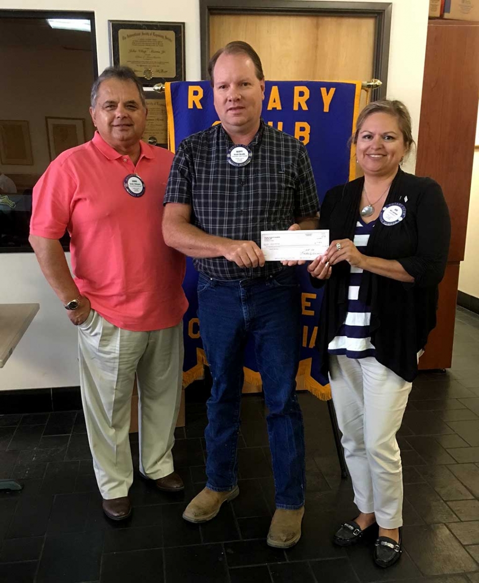 Rotarian Scott Beylik presented a donation check to Boys & Girls Club board members Ernie Villegas and Ari Larson. Photos Courtesy Martha Richardson.